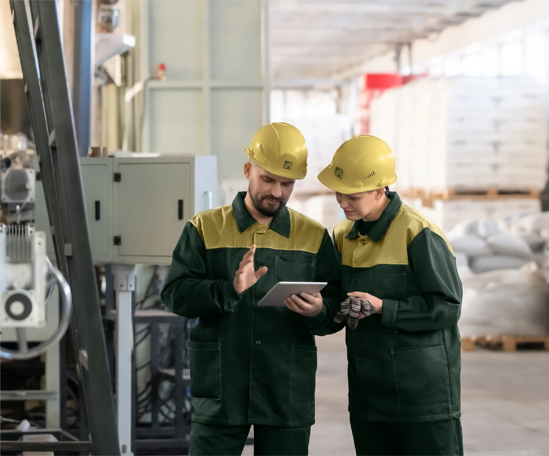 Manufacturing partners reviewing production
